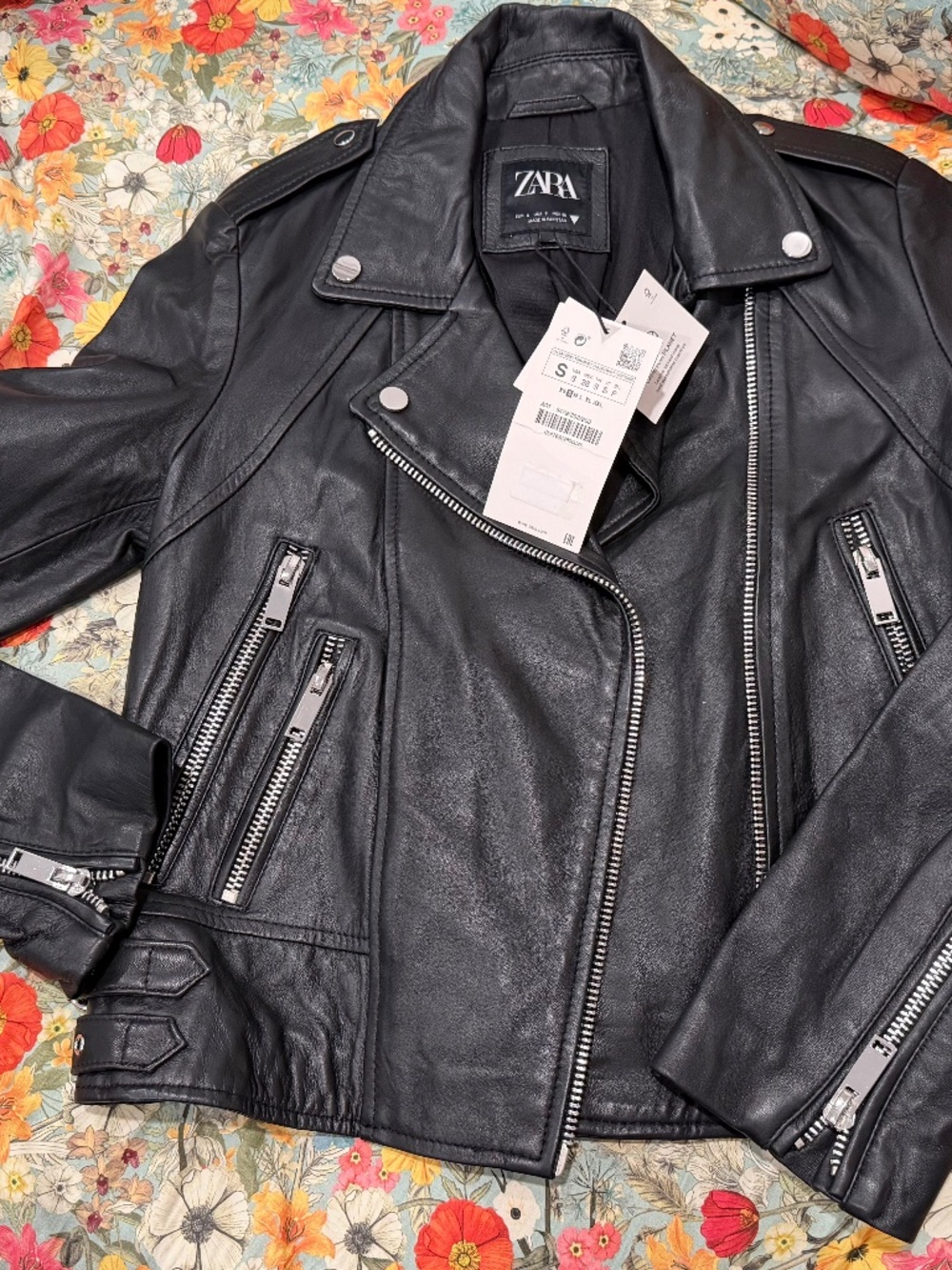 Authentic Zara black moto jacket, size small, made from real leather.  Brand new